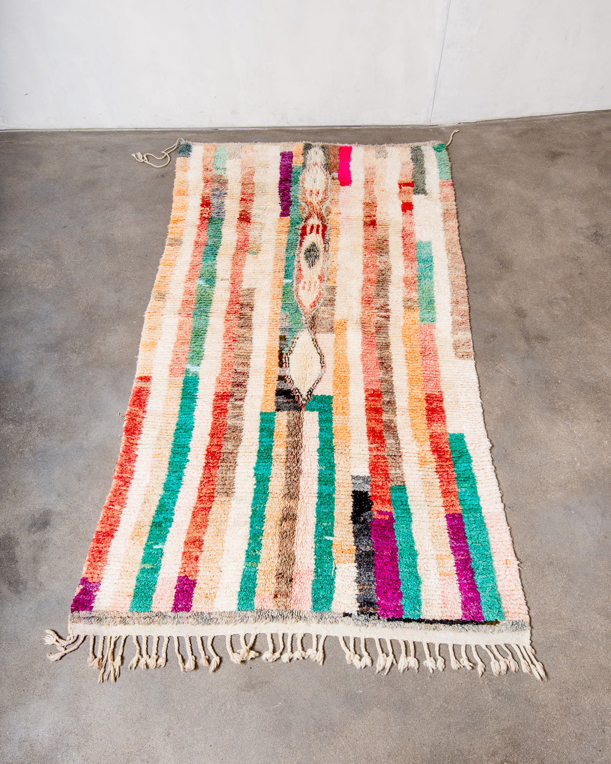 Modern, designer, handcrafted Berber rug from Morocco. Vintage carpet with beautiful colours and patterns and fluffy texture.